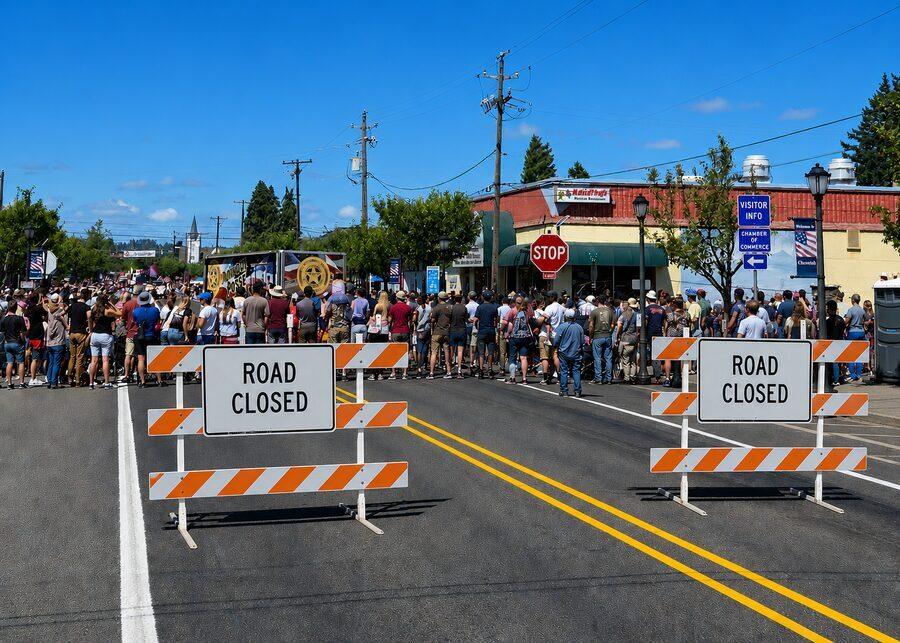 Westates Flagman road closed barriers at Cottage Grove 4th of July parade